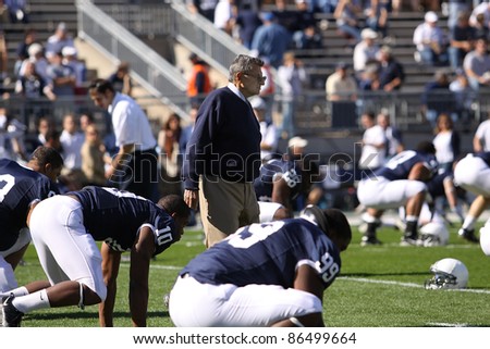 UNIVERSITY PARK, PA - OCT 9: Penn State coach Joe Paterno walks among his players prior to the start of a game against Illinois at Beaver Stadium on October 9, 2010 in University Park, PA
