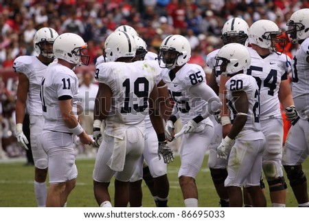 PHILADELPHIA, PA. - SEPTEMBER 17: Penn State quarterback Matthew McGloin calls a play in the huddle in a game against Temple on September 17, 2011 at Lincoln Financial Field in Philadelphia, PA.