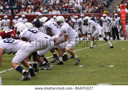 PHILADELPHIA, PA. - SEPTEMBER 17: Penn State quarterback Matthew McGloin takes the snap during a game against Temple on September 17, 2011 at Lincoln Financial Field in Philadelphia, PA.