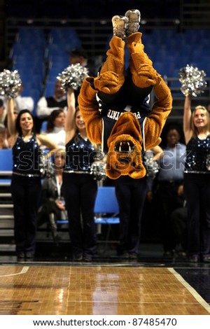 UNIVERSITY PARK, PA - JANUARY 5: Penn State\'s mascot the Nittany Lion preforms a flip for the crowd during a game against Purdue at the Byrce Jordan Center on January 5, 2011 in University Park, PA