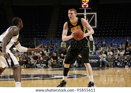 UNIVERSITY PARK, PA - FEB 16:Iowa\'s Aaron White looks to pass out of the post during a game against Penn State at the Byrce Jordan Center on February 16, 2012 in University Park, PA