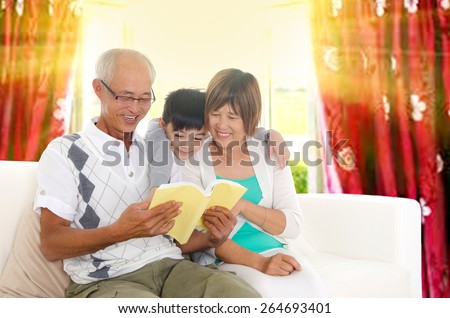 Grandparent and grandson enjoyed reading