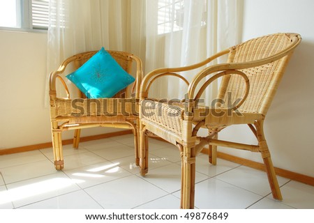 Rattan chairs in a living hall