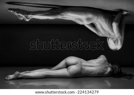 beautiful bodies of young women over dark background