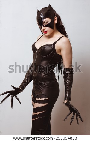 attractive woman in leather latex cat costume