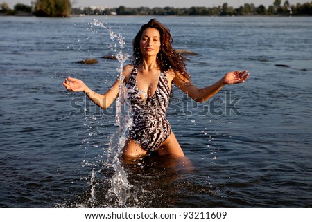 Beautiful women play with water
