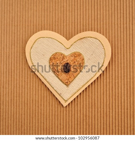 Love heart shape paper card or menu book cover. Handmade using brown, beige and tan paper.