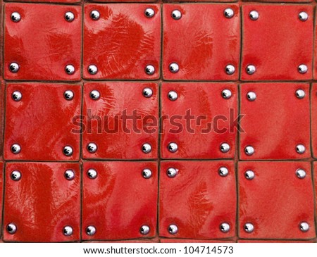Red patent leather upholstary squares texture