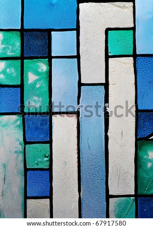 Very old abstract stained glass print texture. Old stained glass window.