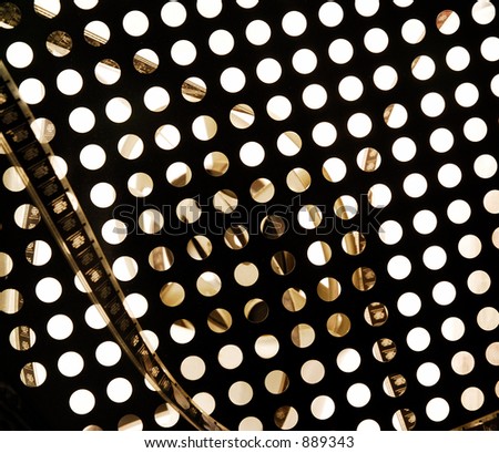 Filmstrip behind a grid - represents the phrase \