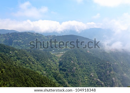 china lushan mountain scenery,overlooking  the lake in valley with clouds and fog