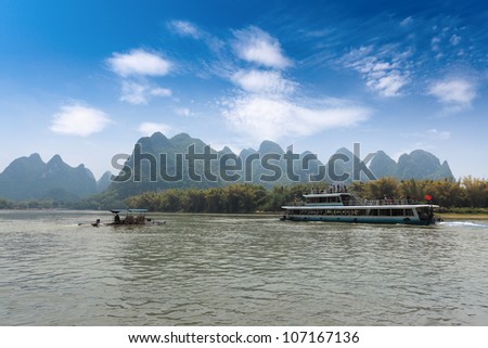 cruise and bamboo raft in beautiful lijiang river,guilin,China