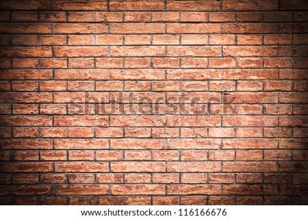 old brick wall texture with dark corners background