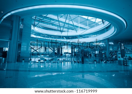 modern hall in transportation hub with blue tone