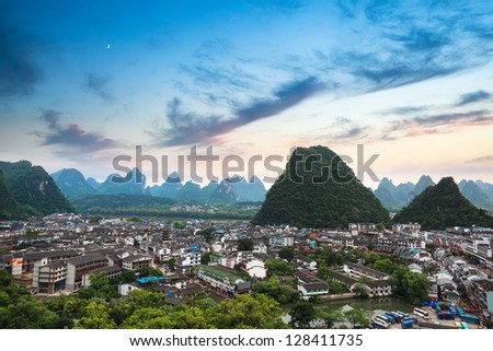 aerial view of yangshuo county town with sunset glow ,beautiful karst mountain scenery,China