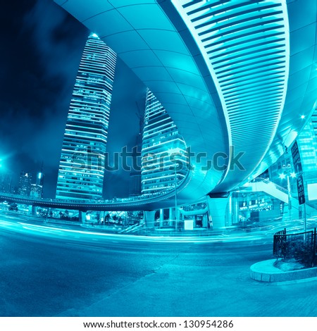 night scene of shanghai downtown under the sightseeing flyover with blue tone