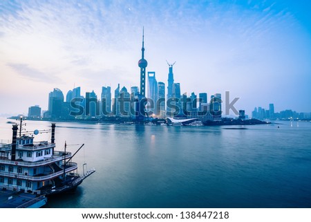 dawn in shanghai,the tranquil of the huangpu river and the pudong skyline,China