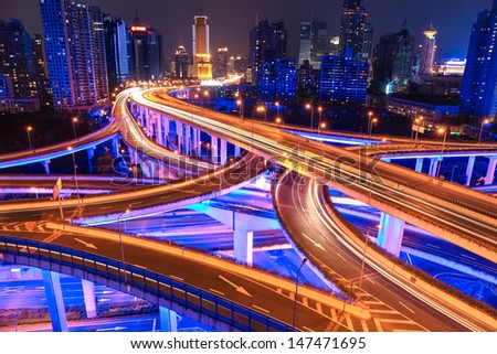 Colorful City Interchange Overpass At Night In Shanghai,China