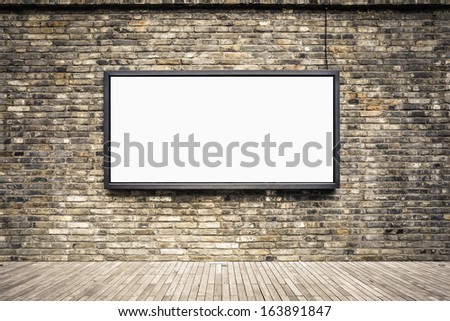blank advertising light box in the old brick wall for your advertisement