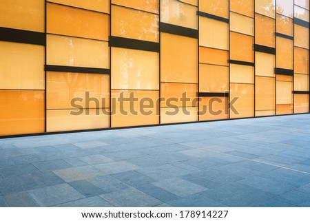 modern streets and yellow curtain wall building glass background