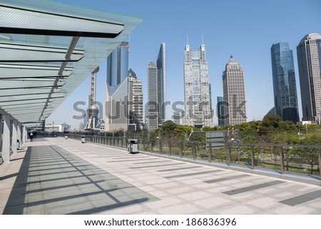 cityscape of shanghai financial center on sightseeing platform bridge