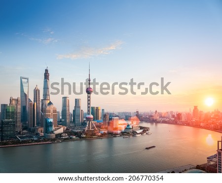 beautiful shanghai at dusk , huangpu river and financial district skyline in sunset