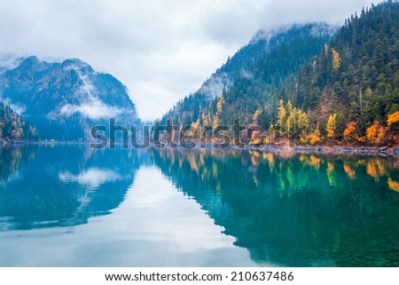 beautiful long lake in autumn jiuzhaigou valley national park , China