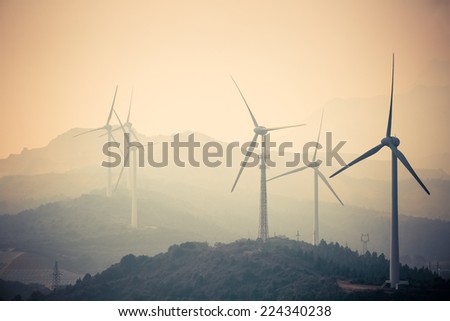 wind farm at dusk - new energy in jiangxi lushan mountain ,poyang lakeside