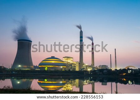 coal power plant in nightfall , industry landscape