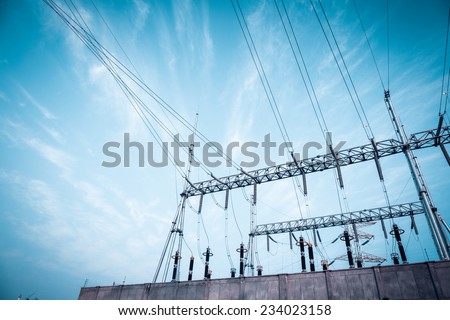 transformer substation against a blue sky ,electricity background