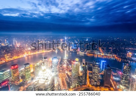 a bird\'s eye view of magic city of shanghai at night