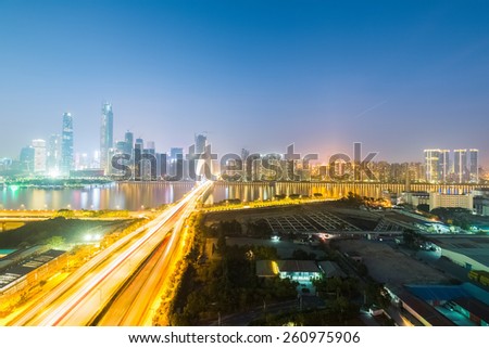 aerial view of guangzhou pearl river new town skyline with liede bridge at night