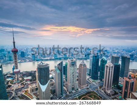 a bird\'s eye view of shanghai at dusk, charming modern city