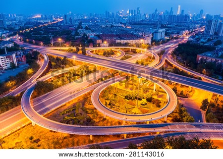 an overpass closeup on the junction at night in tianjin, China