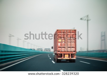 container truck on the bridge with motion blur , modern logistics background