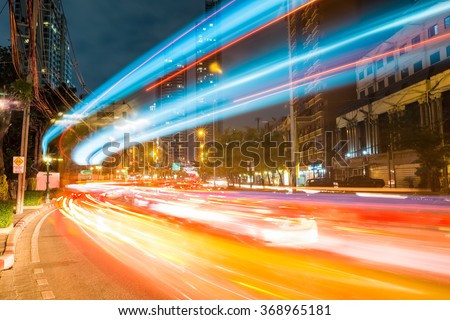 bangkok cityscapeof light trails with blurred colors on the street at night, thailand