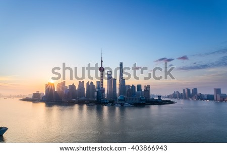charming shanghai in sunrise, pudong skyline and huangpu river, China.