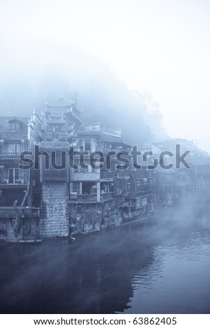 ancient town of phoenix at dawn in the fog