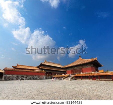 the imperial palace against a blue sky in beijing