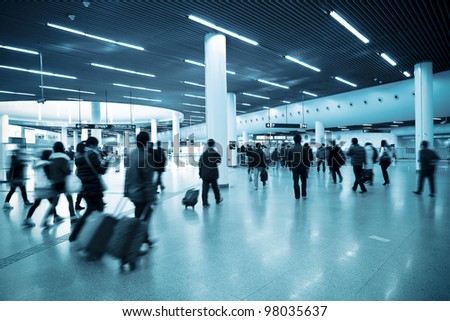 passenger in shanghai metro transfer center with motion blur