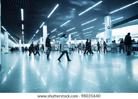 passenger motion blur in  shanghai metro transfer center