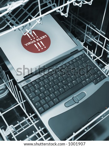 Notebook in dishwasher from above  - virus alert