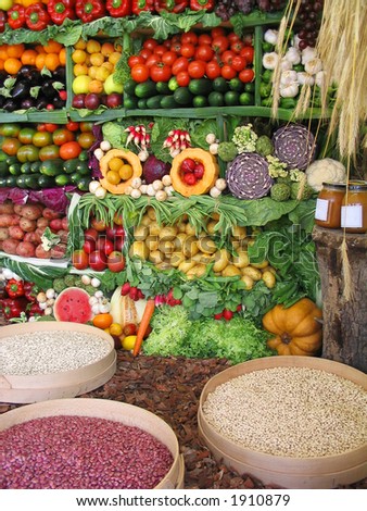 Fresh vegetables, beans, honey and fruits at a farmer\'s market