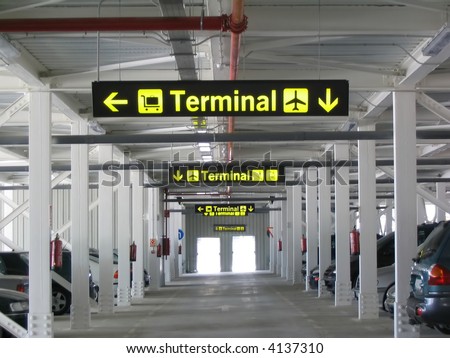Terminal signs at the airport's parking