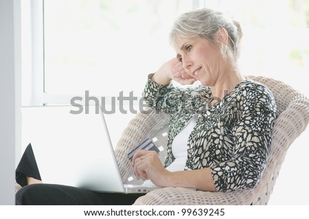 An Attractive 40 Something Woman Shops on Line