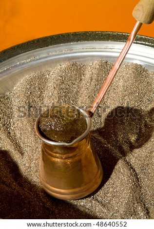 Turkish coffee on hot sand.