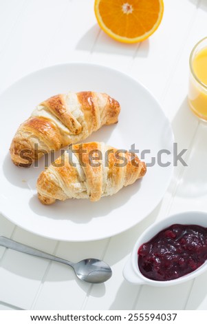 delicious breakfast with croissants and juice