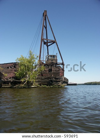 Turn of the century wooden crane abandoned on the Hudson River.