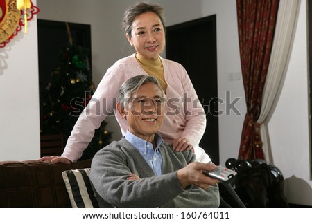 Chinese mature couple watch TV