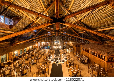 WEST YELLOWSTONE, MONTANA - JULY 29: Empty dining room of the Old Faithful Inn on July 29, 2012 in West Yellowstone, Montana